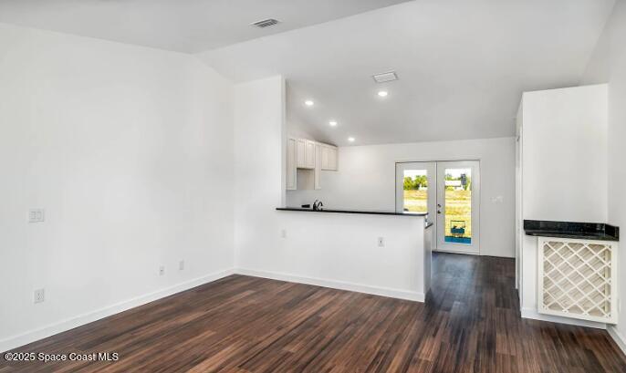 1837 Ardmore Street Northeast Palm Bay, FL 32907 - Photo 3 of 23 a view of empty room with wooden floor