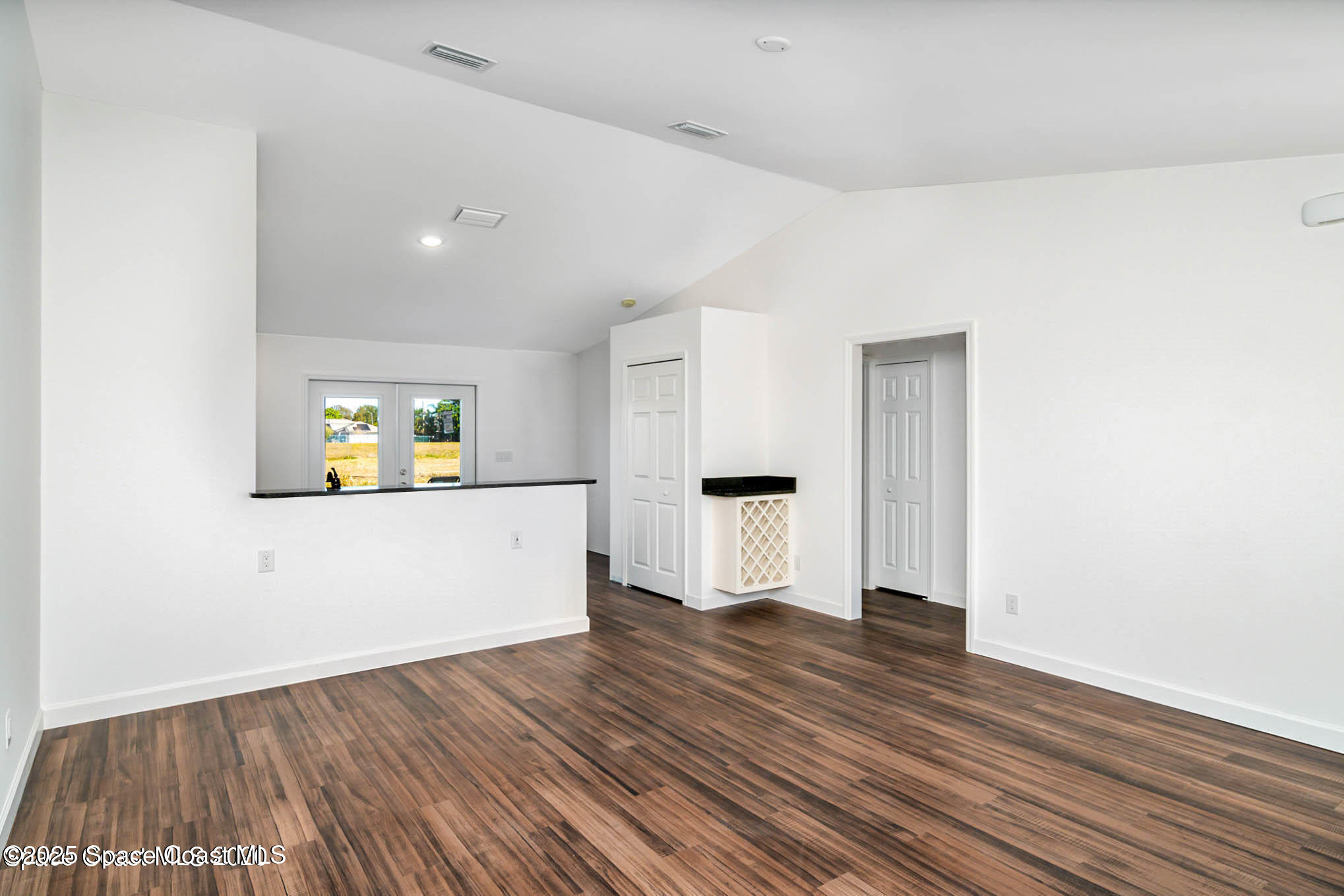 1837 Ardmore Street Northeast Palm Bay, FL 32907 - Photo 4 of 23 a view of empty room with wooden floor