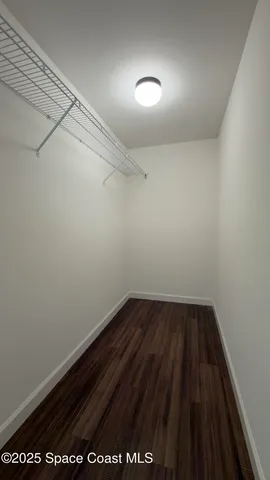 a view of small space with racks on the wall