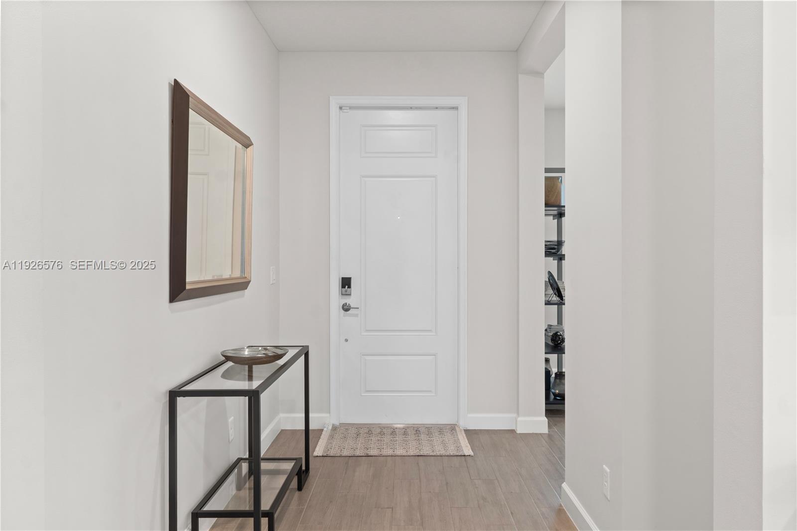 1162 Haywagon Trail Loxahatchee, FL 33470 - Photo 6 of 48 a view of a hallway with interior of the house