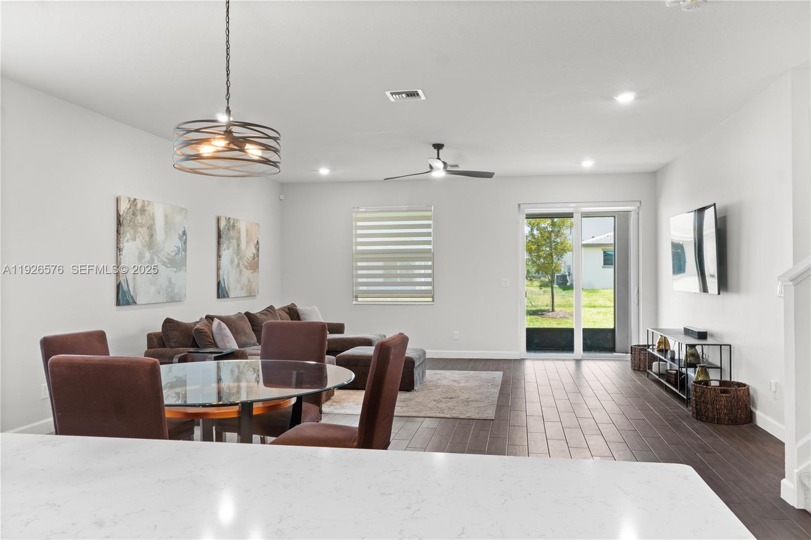 1162 Haywagon Trail Loxahatchee, FL 33470 - Photo 9 of 48 a living room with furniture or window and a flat screen tv