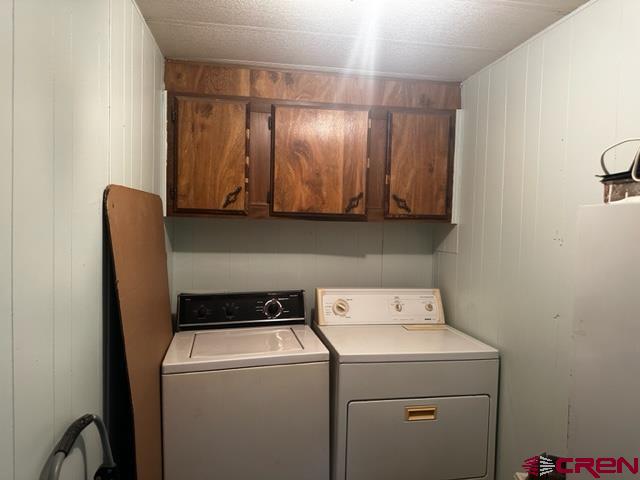 24020 Rd F 5, Unit 5 Cortez, CO 81321 - Photo 12 of 15 a utility room with dryer and washer