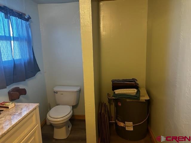 24020 Rd F 5, Unit 5 Cortez, CO 81321 - Photo 5 of 15 a bathroom with a toilet and a sink