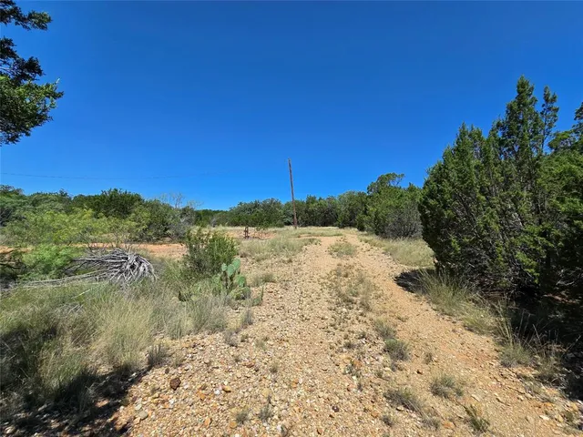 a view of lake with green space