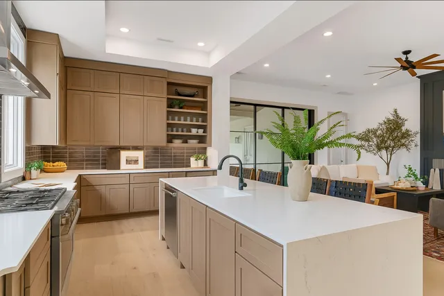 a bathroom with a shower and a sink