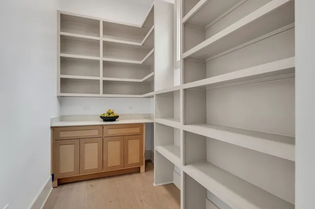 a bathroom with a toilet sink and shower