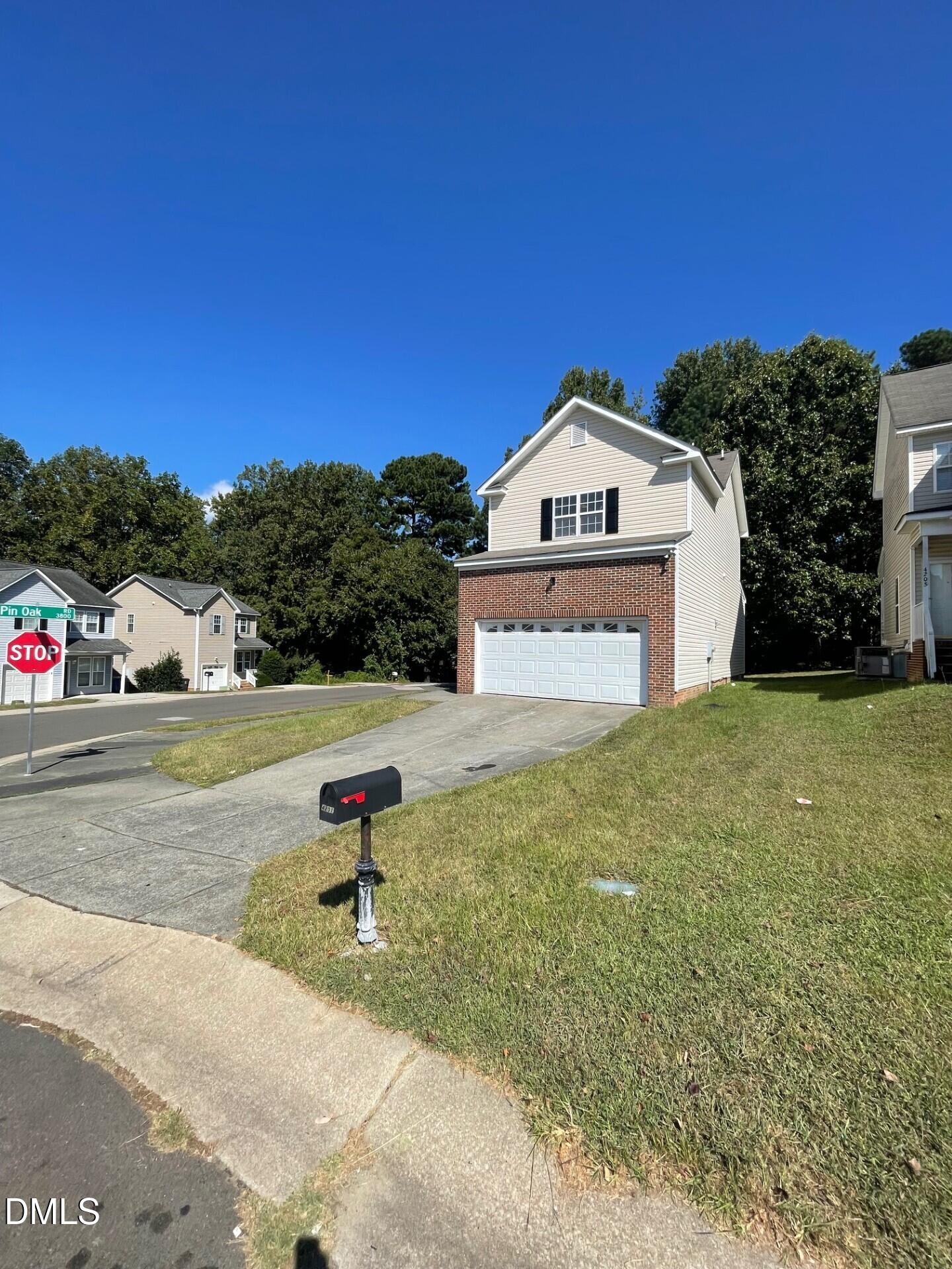 4201 Beacon Crest Way Raleigh, NC 27604 - Photo 2 of 21 a front view of a house with a yard