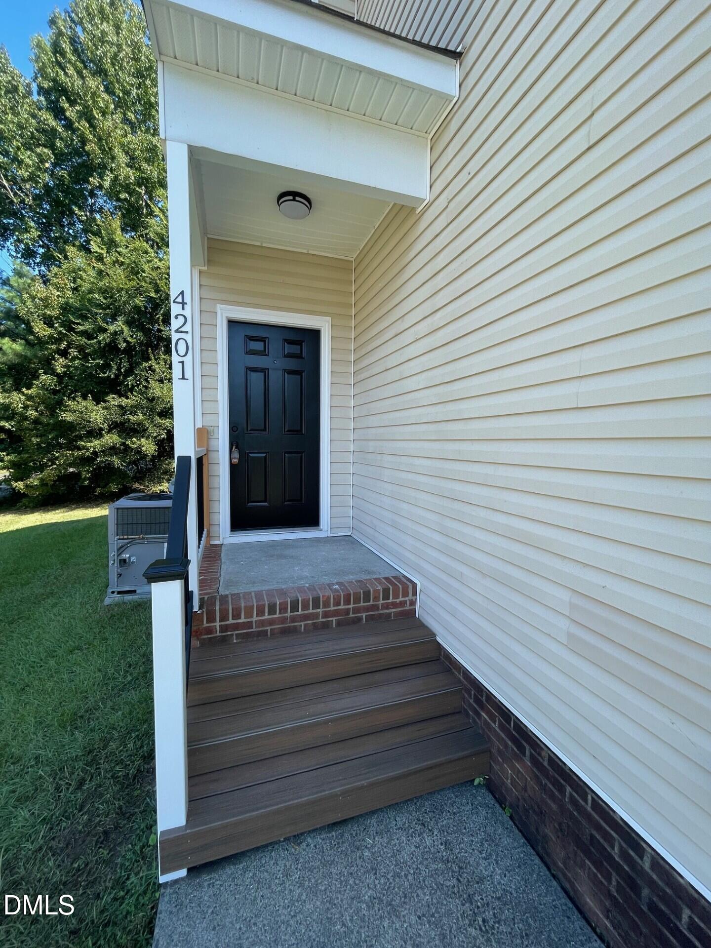 4201 Beacon Crest Way Raleigh, NC 27604 - Photo 3 of 21 a view of a house with a door