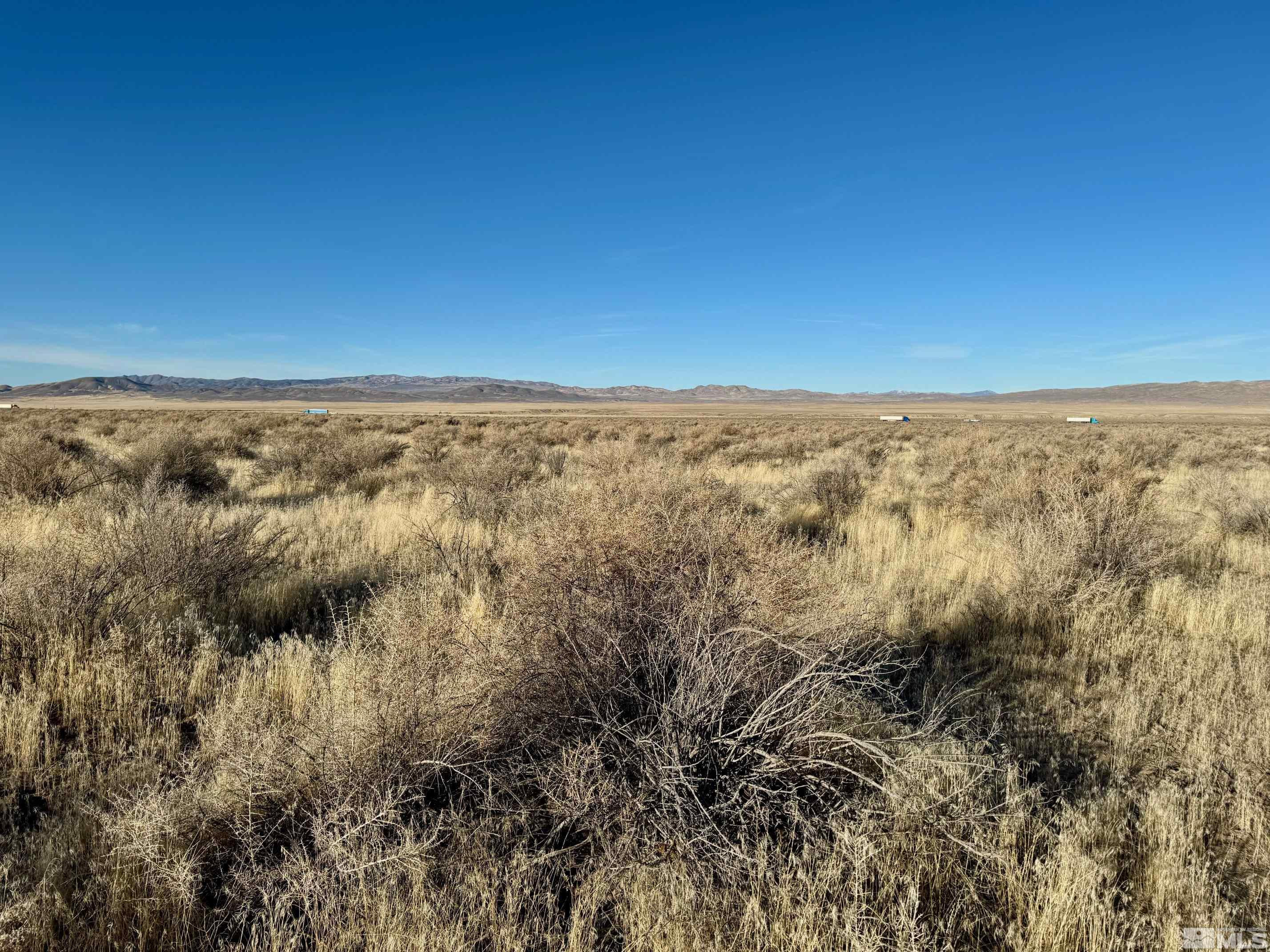 21865 Chimney Creek Road, Unit 6 Lovelock, NV 89419 - Photo 13 of 28 an aerial view of residential houses with ocean view