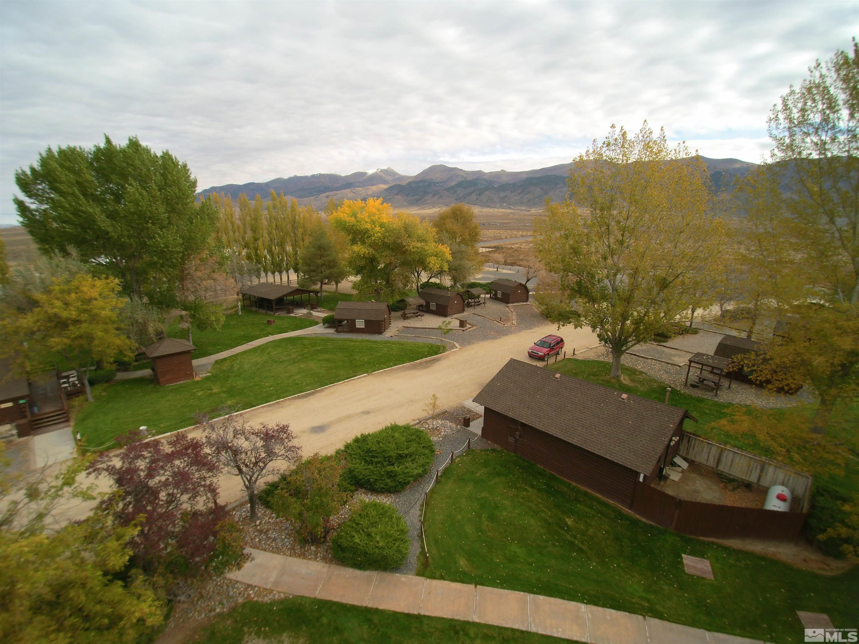 21865 Chimney Creek Road, Unit 6 Lovelock, NV 89419 - Photo 27 of 28 an aerial view of a house with a yard