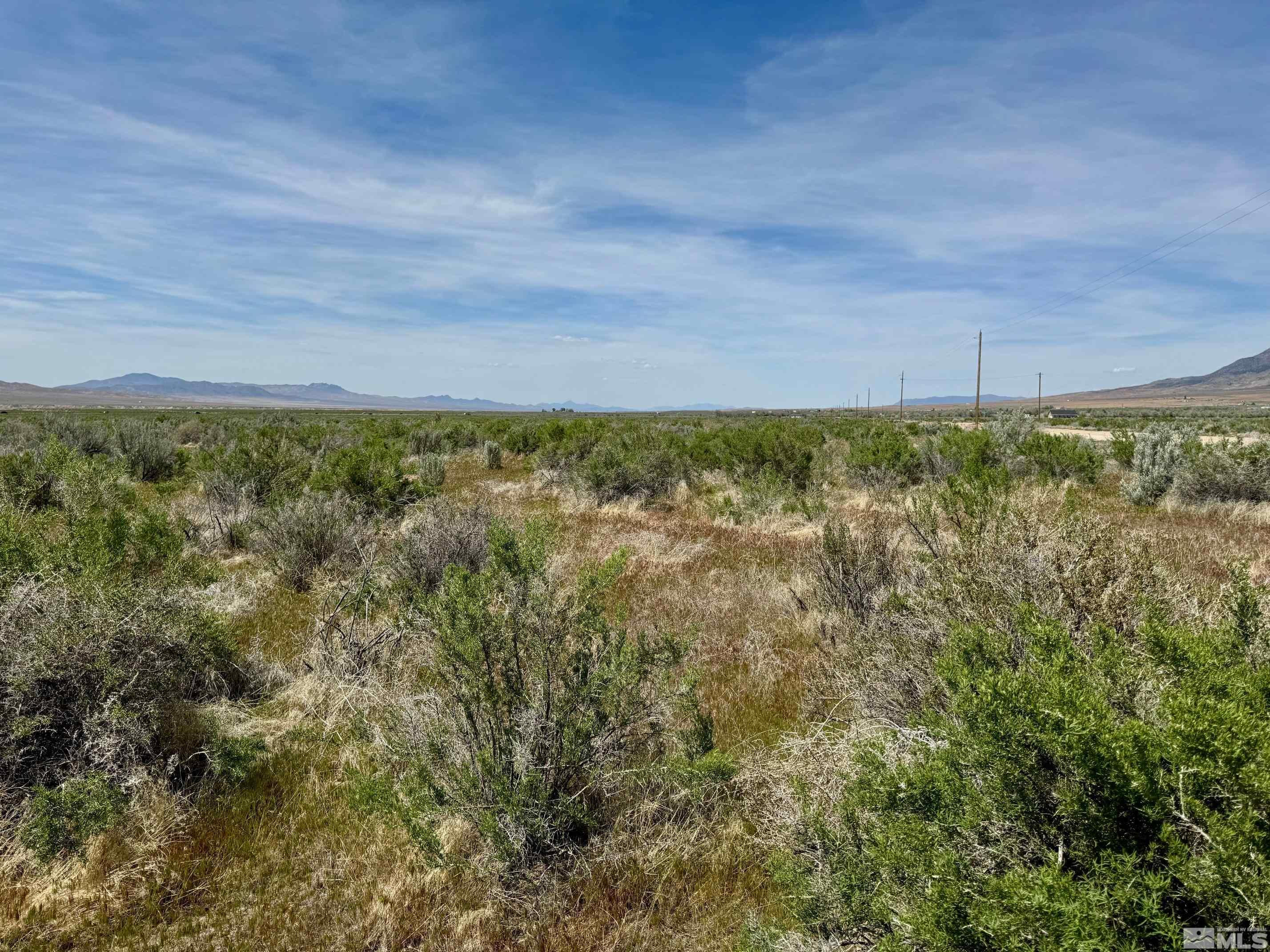 21865 Chimney Creek Road, Unit 6 Lovelock, NV 89419 - Photo 7 of 28 a view of a yard with an outdoor space