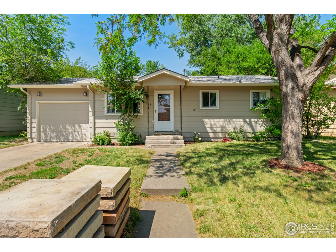 1803 30th Street Road Greeley, CO 80631 - Photo 2 of 10 Front of Home, concrete slabs to be removed