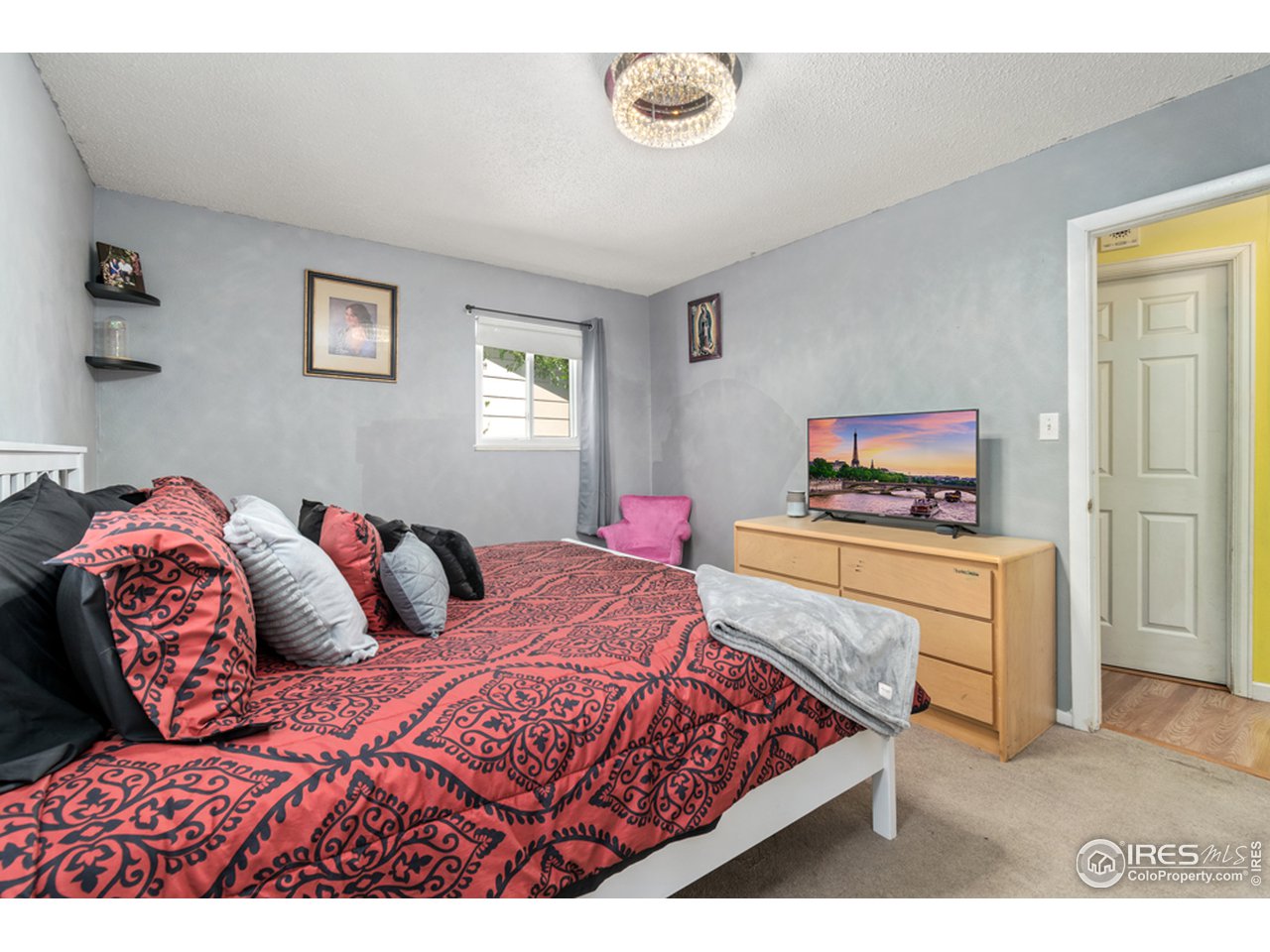 1803 30th Street Road Greeley, CO 80631 - Photo 7 of 10 Primary Bedroom with updated Light fixtures