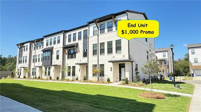 a view of an apartment with a swimming pool