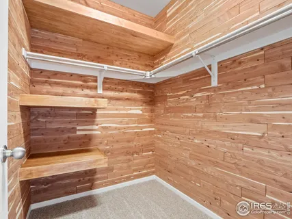 a bathroom with a sink vanity and a mirror