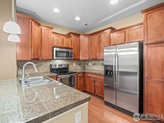 $489,000 | 15496 West 66th Drive, Unit E, Arvada, CO 80007