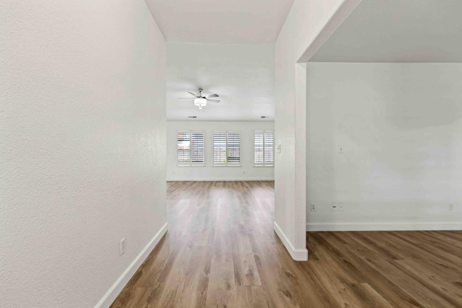 995 West Springer Drive Turlock, CA 95382 - Photo 5 of 39 a view of wooden floor in an empty room