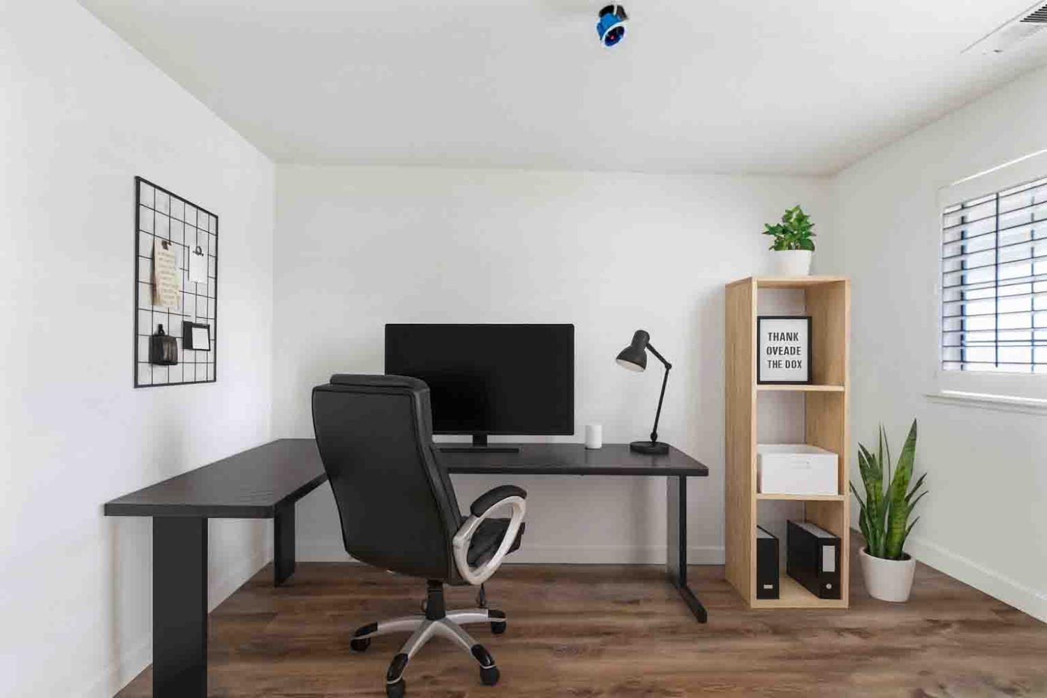 995 West Springer Drive Turlock, CA 95382 - Photo 6 of 39 a view of a workspace with furniture and a window