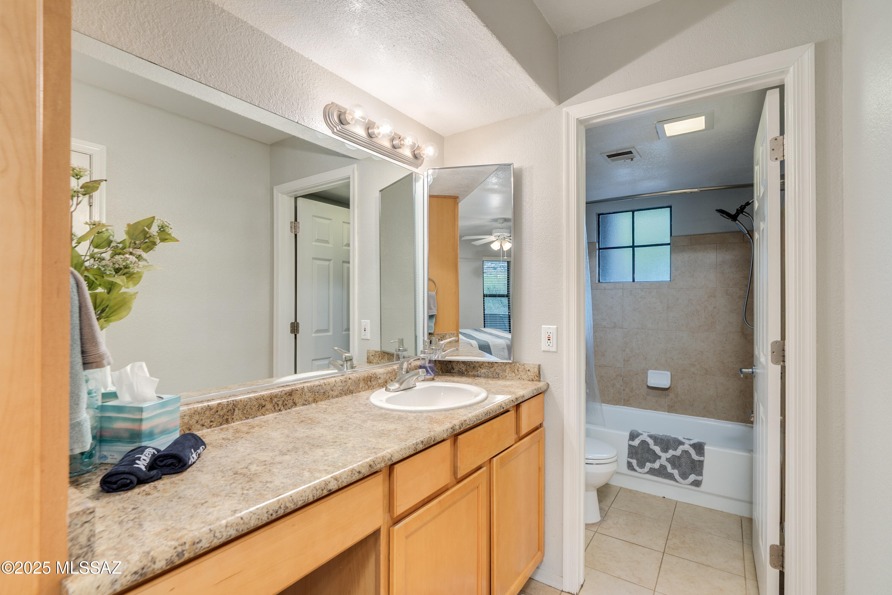 5855 North Kolb Road, Unit 1102 Tucson, AZ 85750 - Photo 15 of 26 Vanity with linen cabinet!
