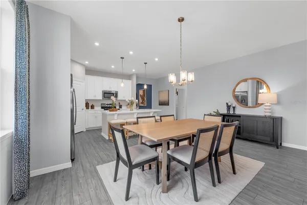 a view of a dining room with furniture