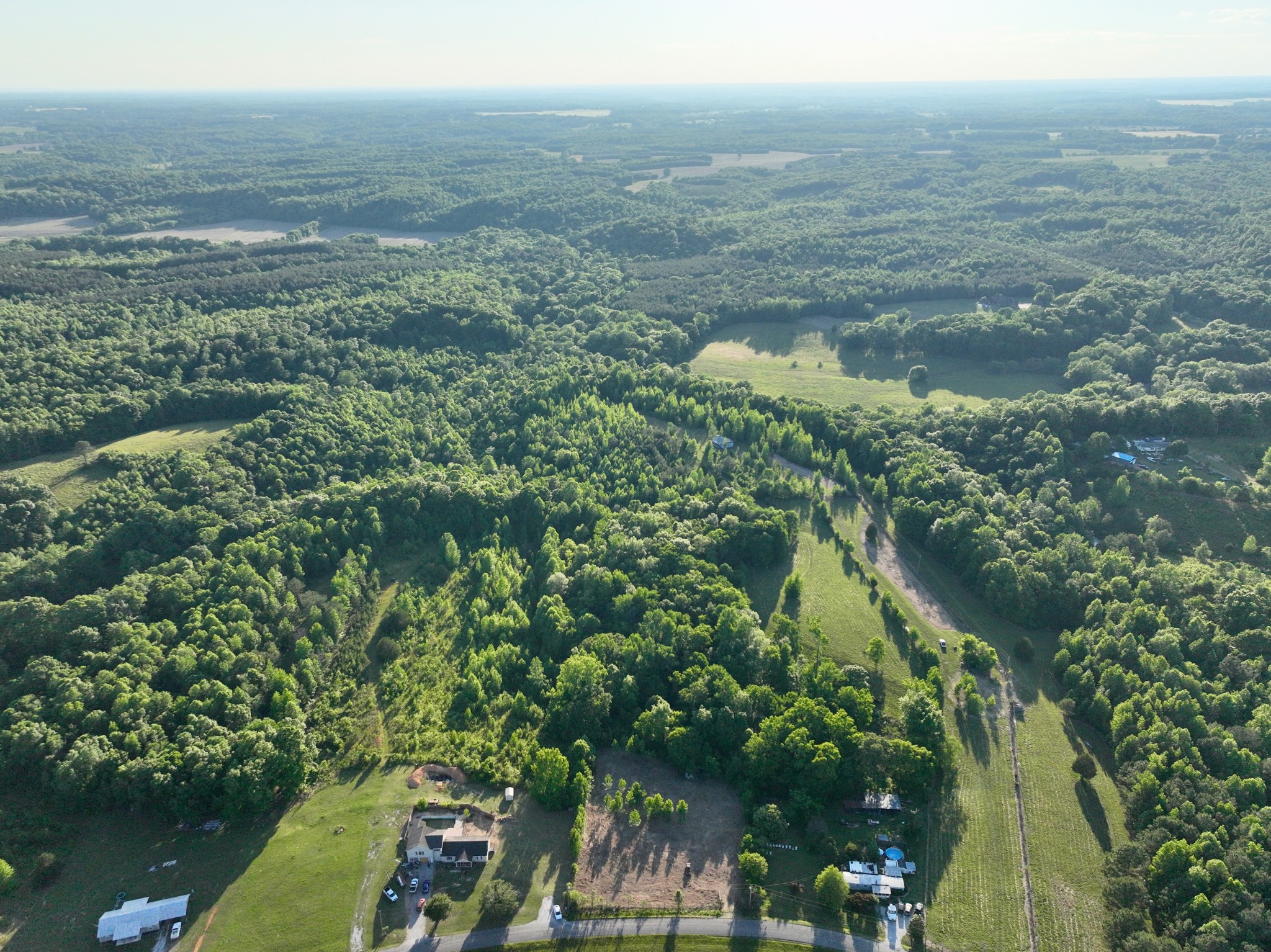 497 Rascal Town Road Loretto, TN 38469 - Photo 13 of 30 a view of a lake with a city