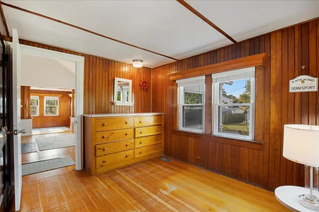 a room with window and mirror