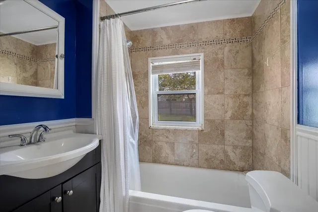 a bathroom with a sink and a bathtub