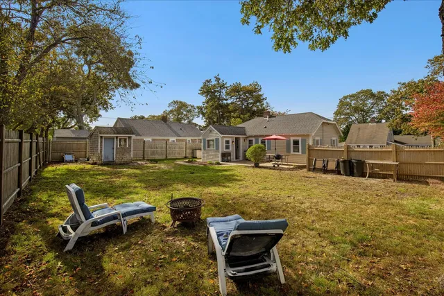 a view of house with outdoor seating space