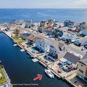 16 Point Road Toms River, NJ 08753 - Photo 3 of 25 an aerial view of residential houses with outdoor space