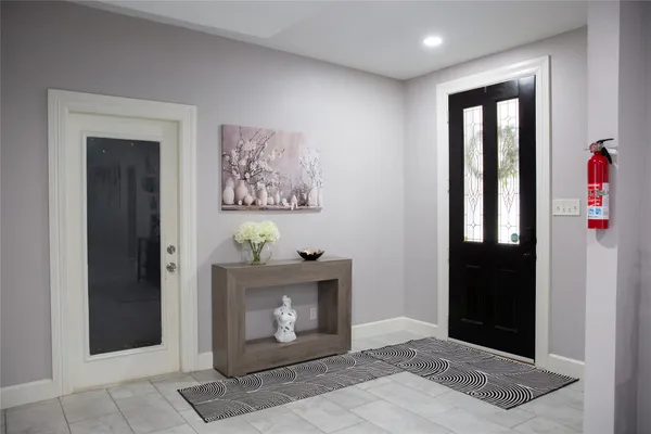 a kitchen with stainless steel appliances kitchen island granite countertop a sink and cabinets