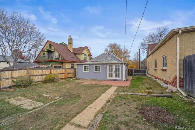 a view of front of house with a yard