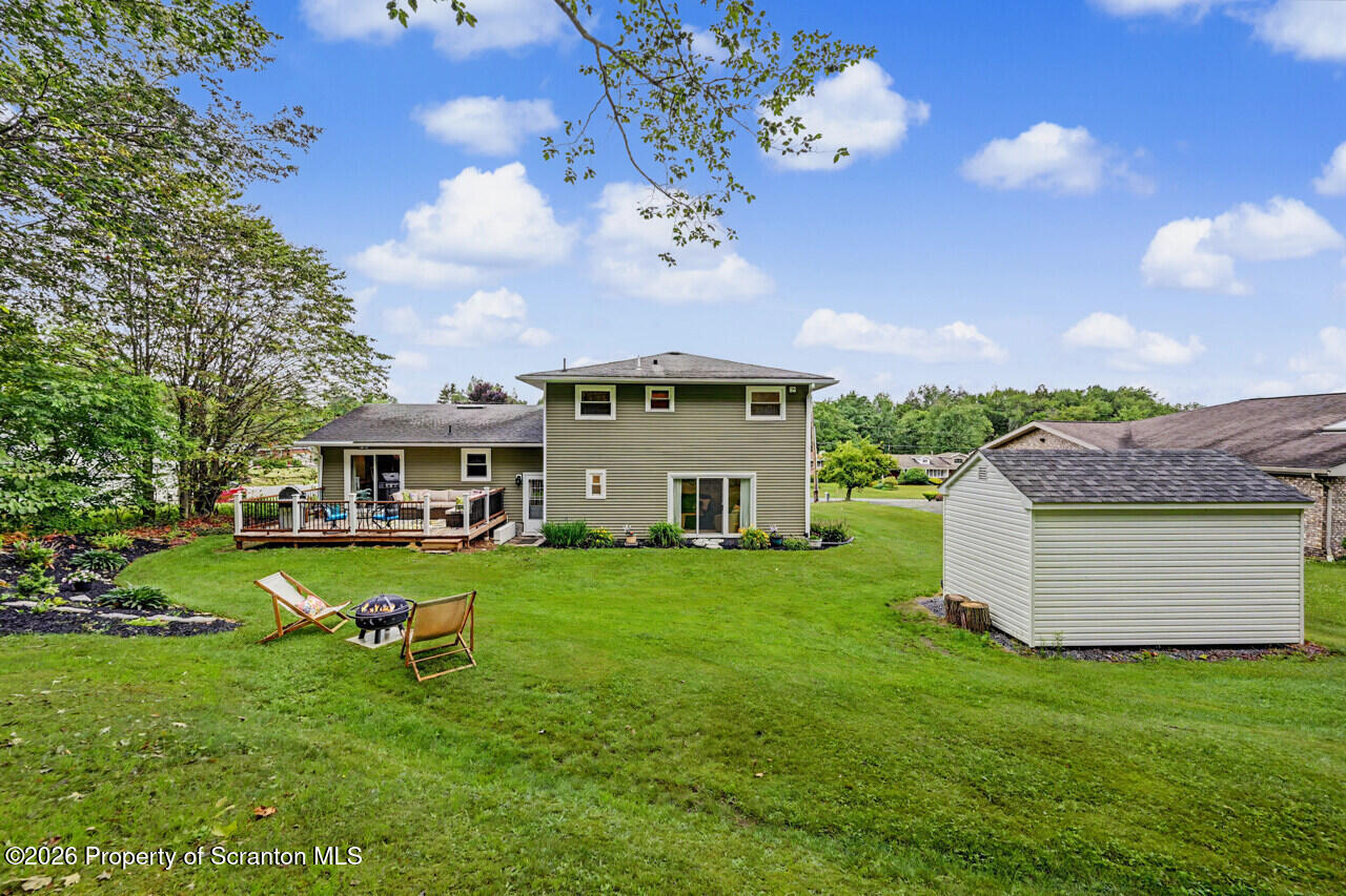 121 T Rt 351 Moscow, PA 18444 - Photo 71 of 79 a front view of a house with garden and trees