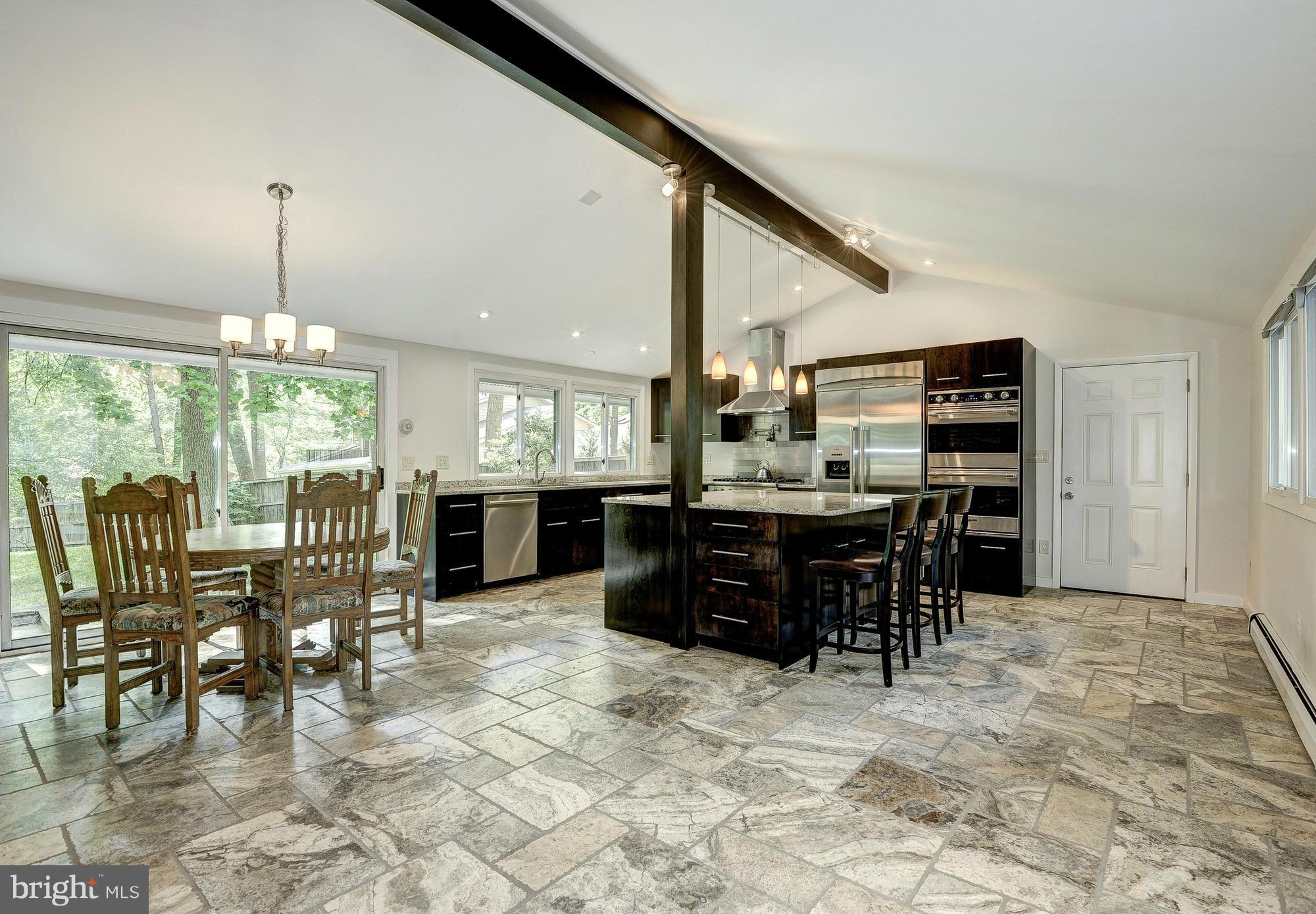 6718 Persimmon Tree Road Bethesda, MD 20817 - Photo 5 of 30 a view of a dining room with furniture window and outside view