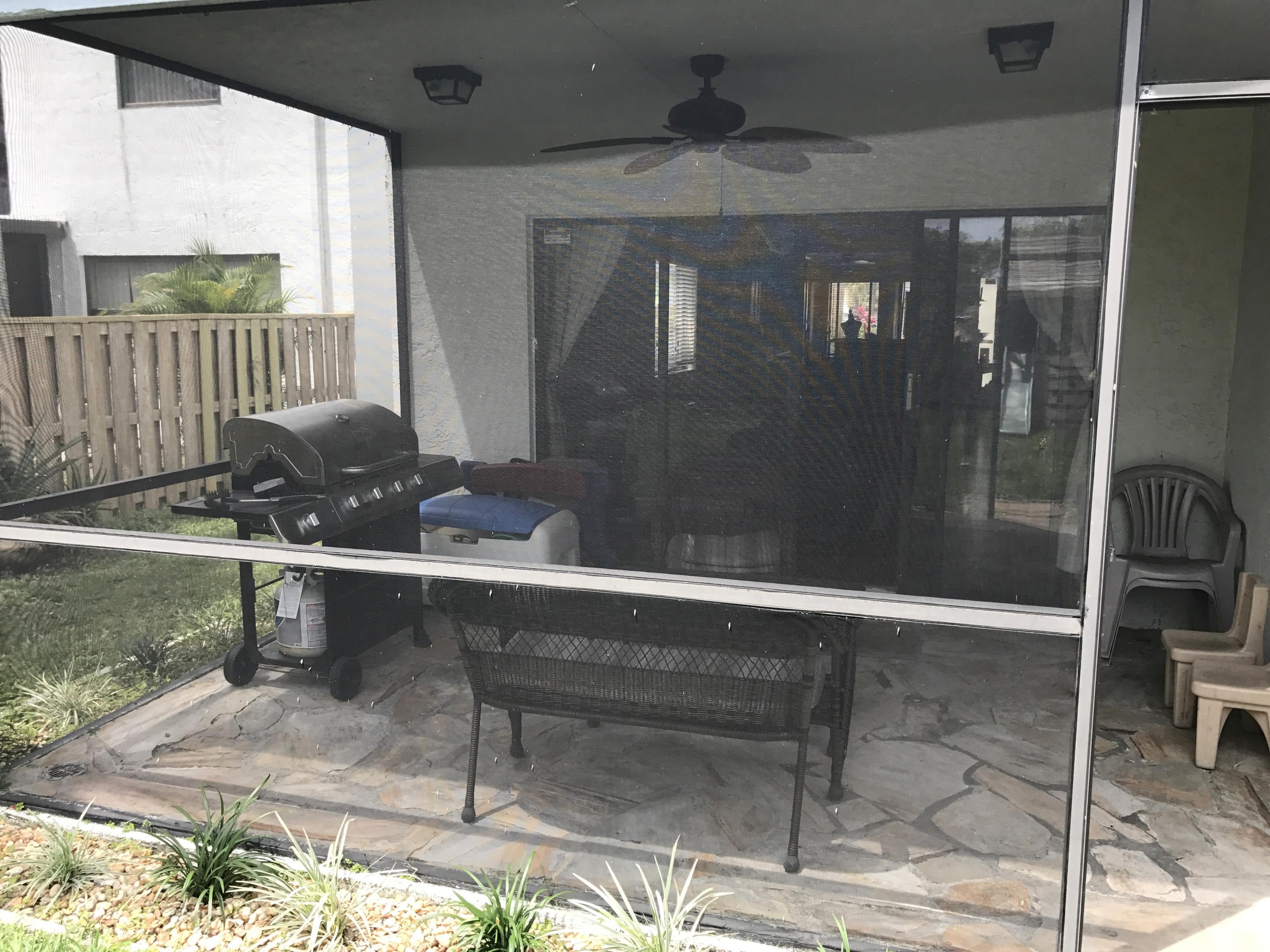 23350 Sedawie Drive Boca Raton, FL 33433 - Photo 25 of 30 Screened in Porch Back of House