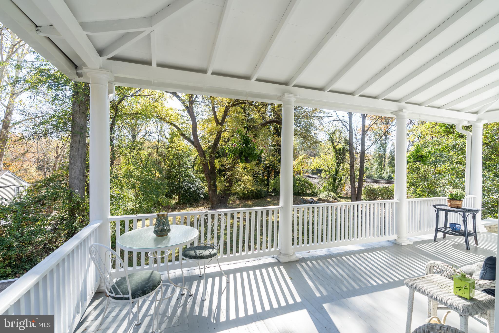 9809 Capitol View Avenue Silver Spring, MD 20910 - Photo 3 of 32 The wrap around porch faces south