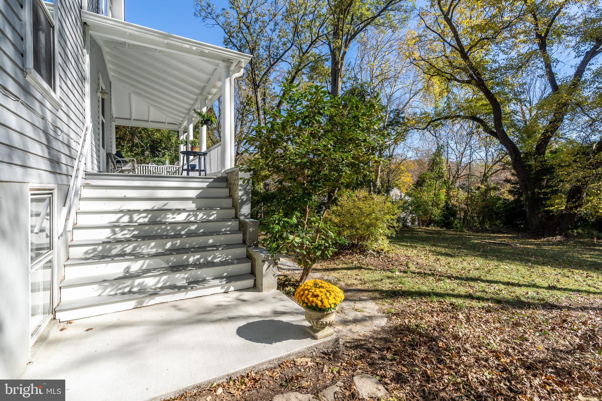 9809 Capitol View Avenue Silver Spring, MD 20910 - Photo 29 of 32 Exterior stairs lead to the wrap around porch from
