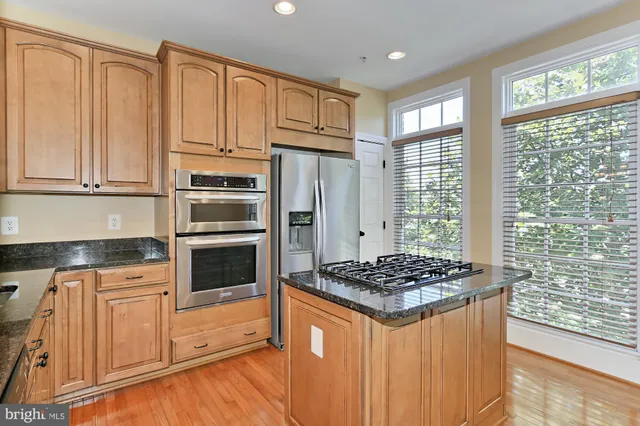 a view of staircase with white walls