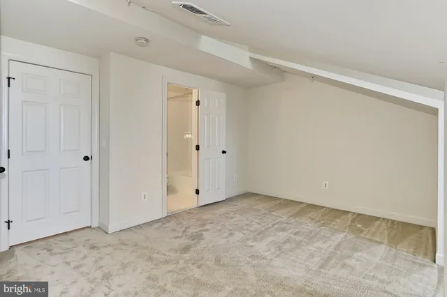 a black and white photo of a living room