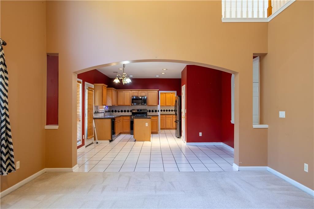 640 Fitzgerald Place Atlanta, GA 30349 - Photo 14 of 46 a view of kitchen with wooden floor