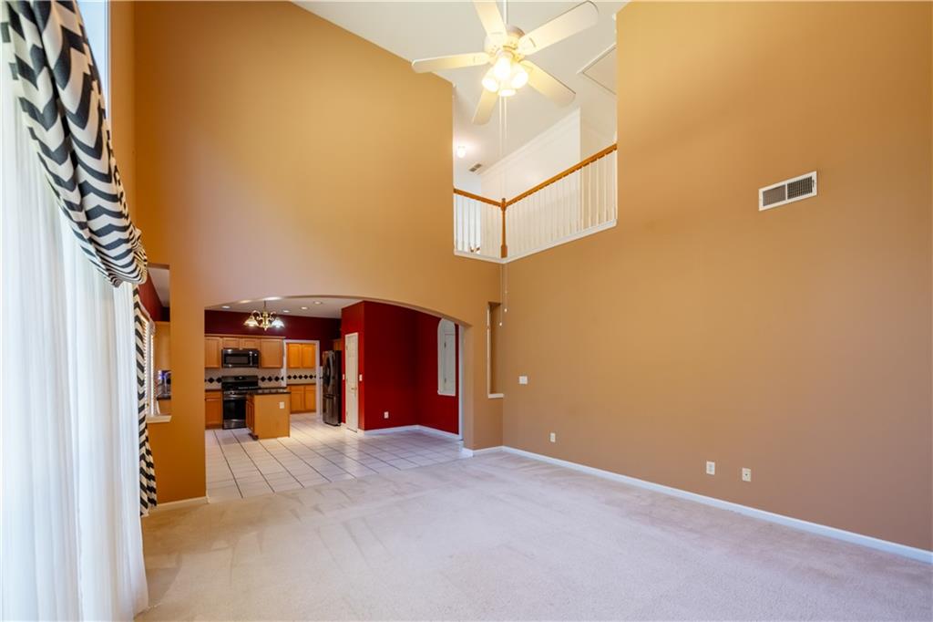 640 Fitzgerald Place Atlanta, GA 30349 - Photo 15 of 46 a view of a livingroom with a staircase