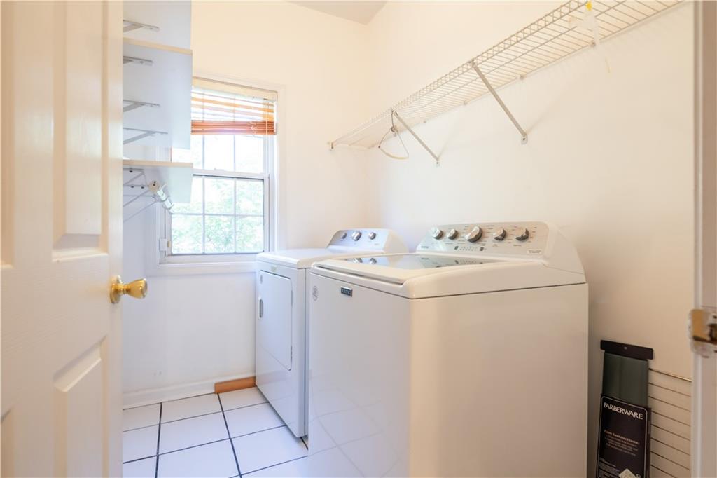 640 Fitzgerald Place Atlanta, GA 30349 - Photo 23 of 46 a utility room with dryer and washer