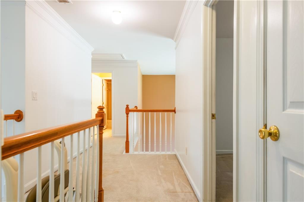640 Fitzgerald Place Atlanta, GA 30349 - Photo 32 of 46 a view of a hallway with wooden floor and entryway