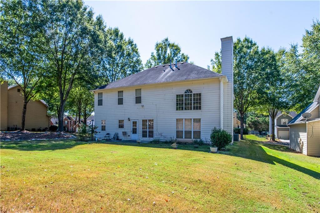640 Fitzgerald Place Atlanta, GA 30349 - Photo 42 of 46 a view of a house with swimming pool and sitting area