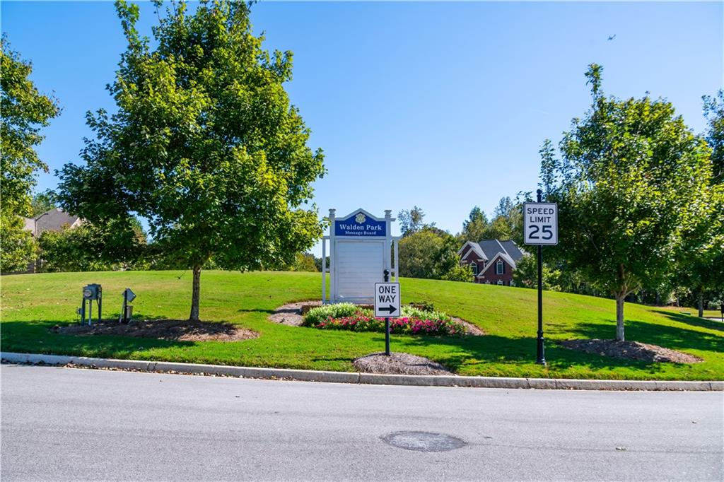 640 Fitzgerald Place Atlanta, GA 30349 - Photo 46 of 46 a green field with lots of trees in the background