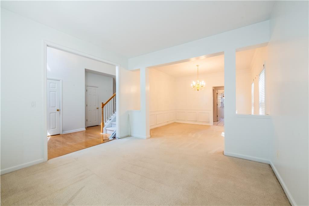 640 Fitzgerald Place Atlanta, GA 30349 - Photo 8 of 46 a view of empty room with a fireplace