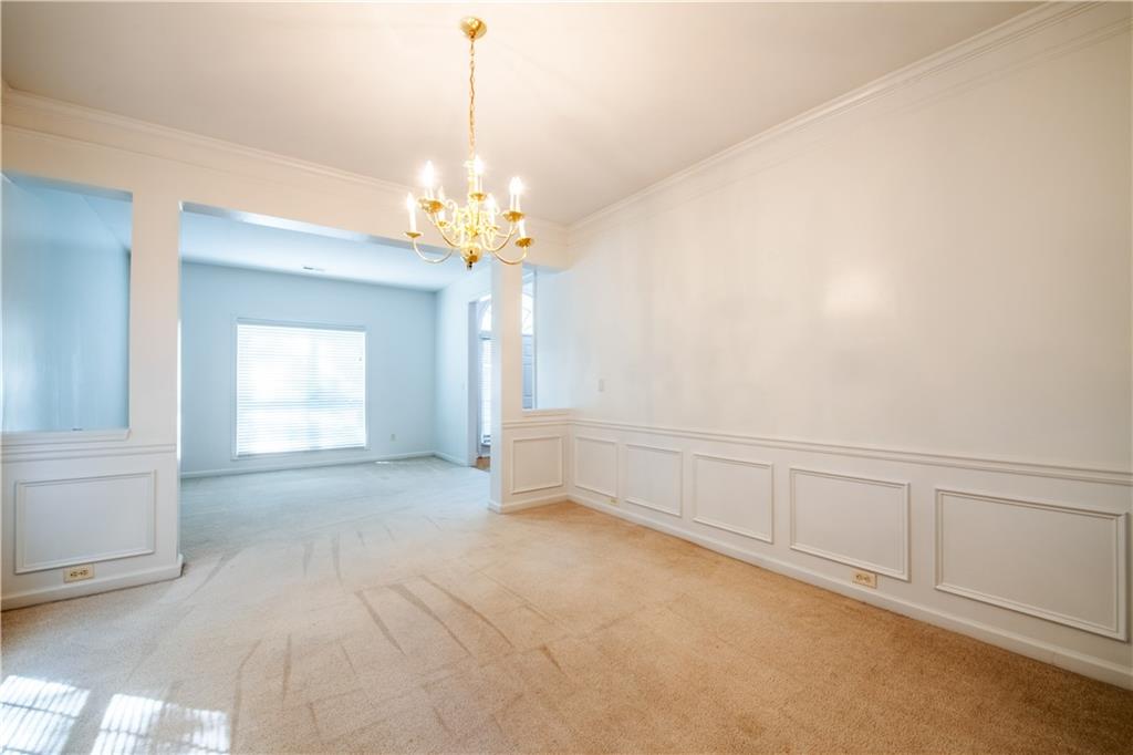 640 Fitzgerald Place Atlanta, GA 30349 - Photo 9 of 46 a view of an empty room with a window