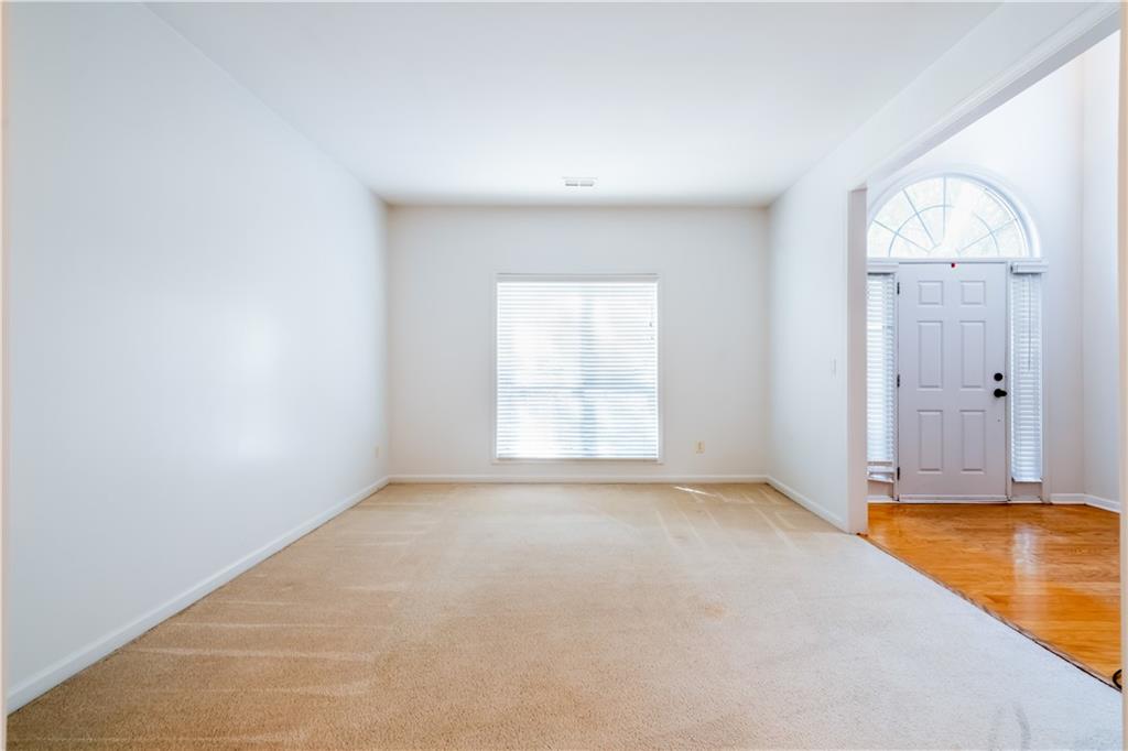 640 Fitzgerald Place Atlanta, GA 30349 - Photo 10 of 46 an empty room with window