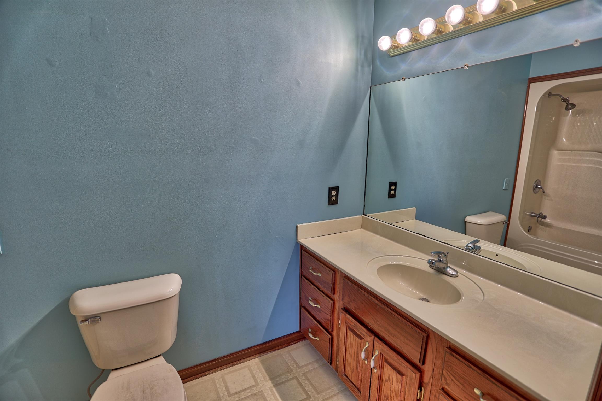 4322 Dot Road Springfield, TN 37172 - Photo 11 of 22 a bathroom with a sink toilet and mirror