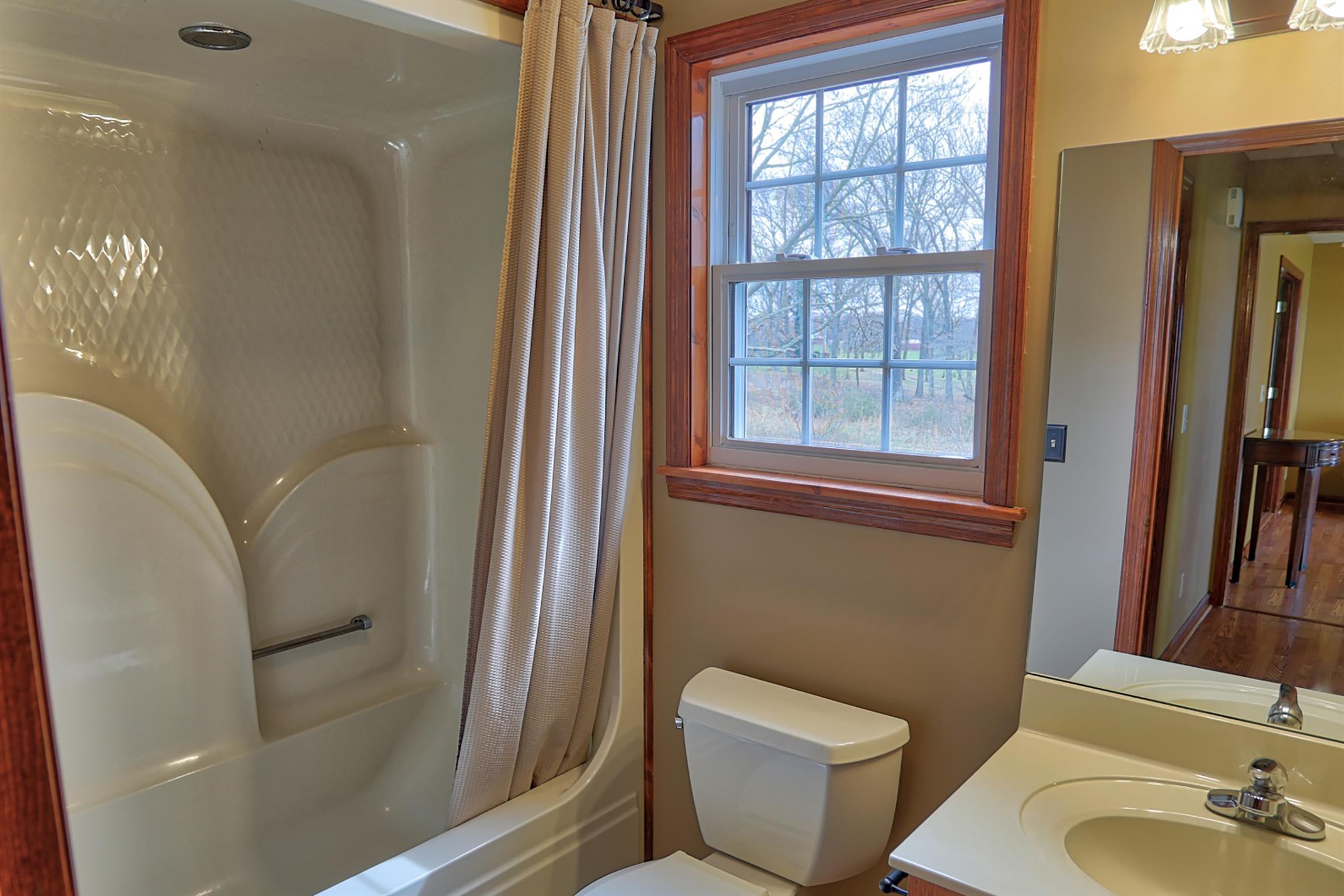 4322 Dot Road Springfield, TN 37172 - Photo 16 of 22 a bathroom with a toilet and a sink