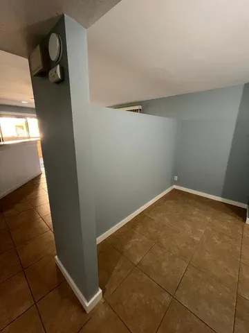 a view of a room with racks on the wall